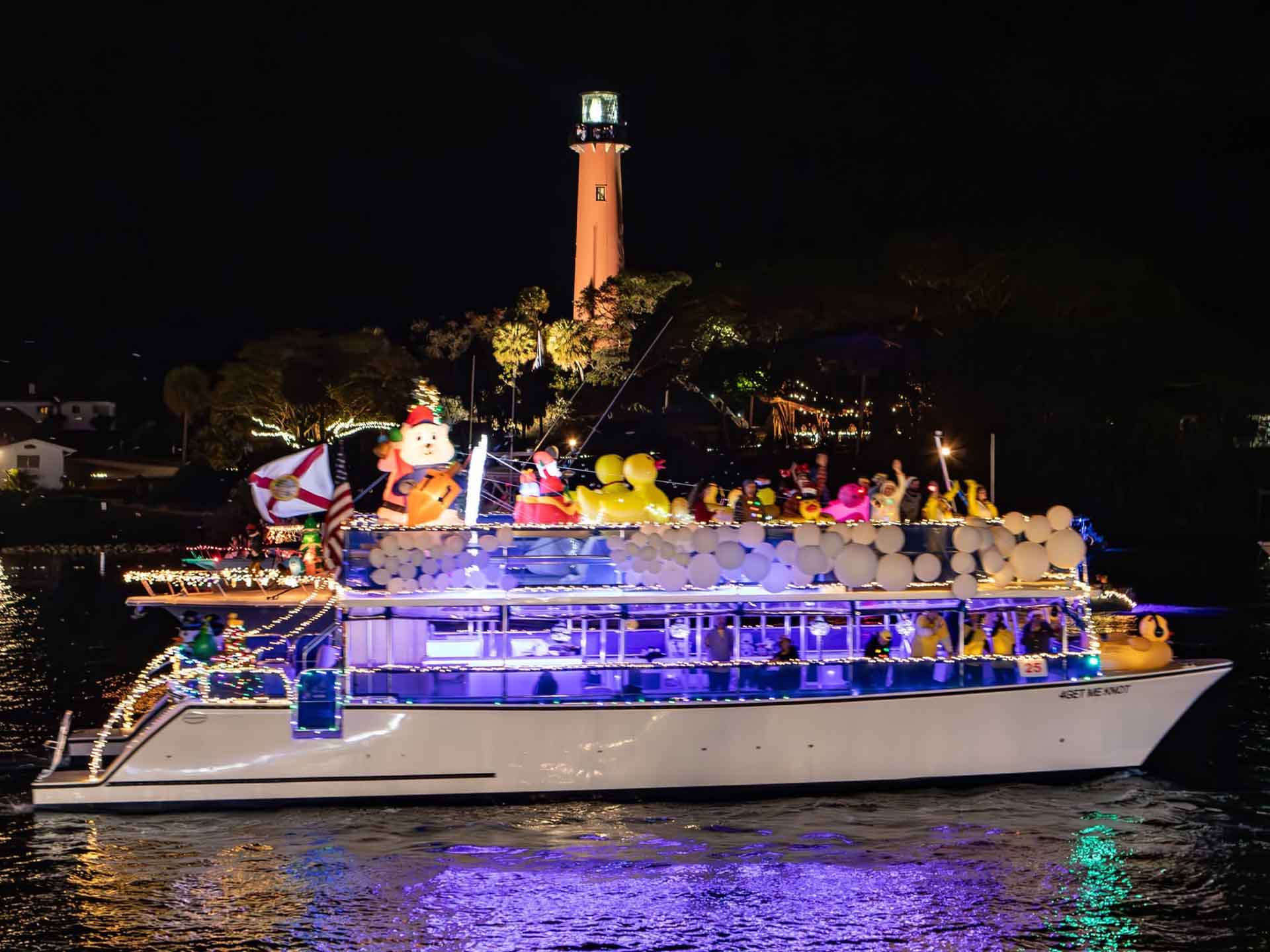 Manatee Queen catamaran with Christmas lights