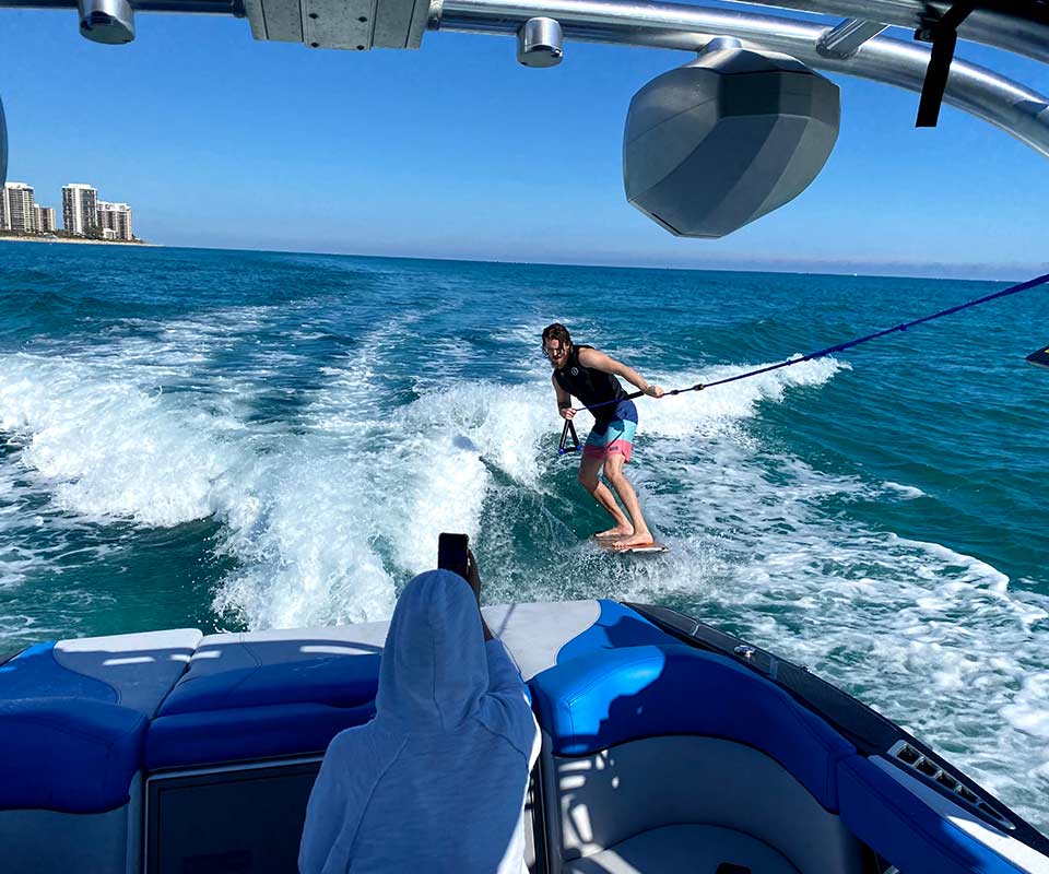 Guy wakeboarding Palm Beach
