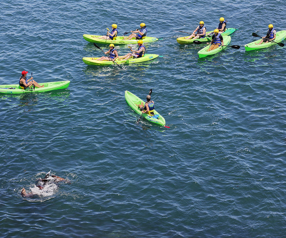 Group in green kayaks